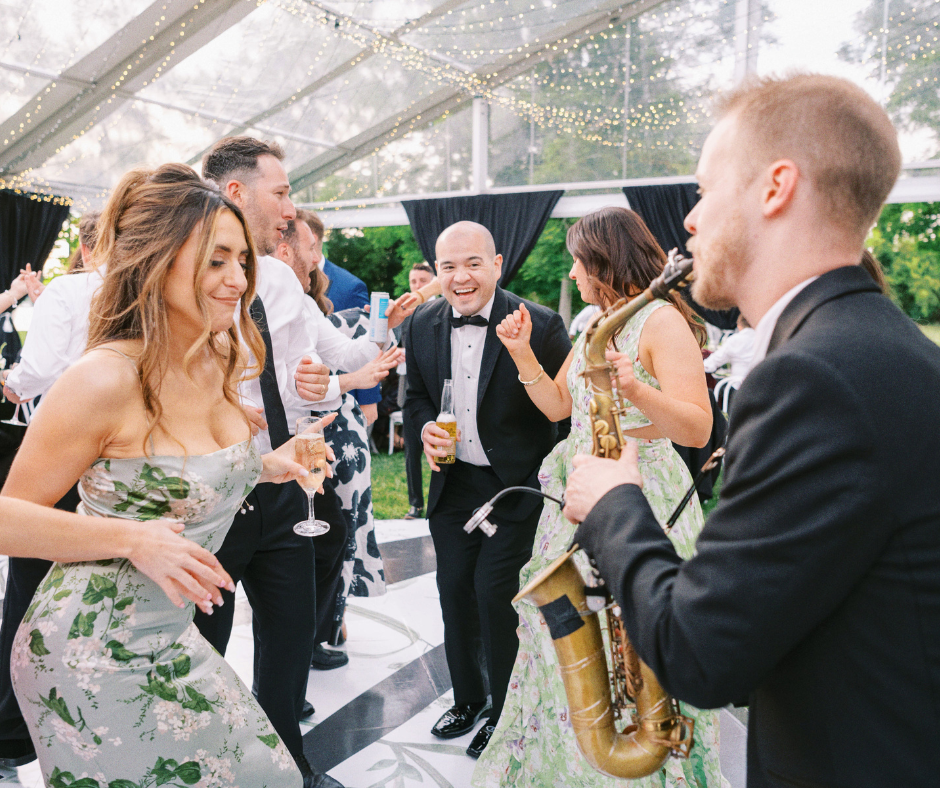 SaxOnIt, Philadelphia Wedding musician, performs at wedding with excited guest!