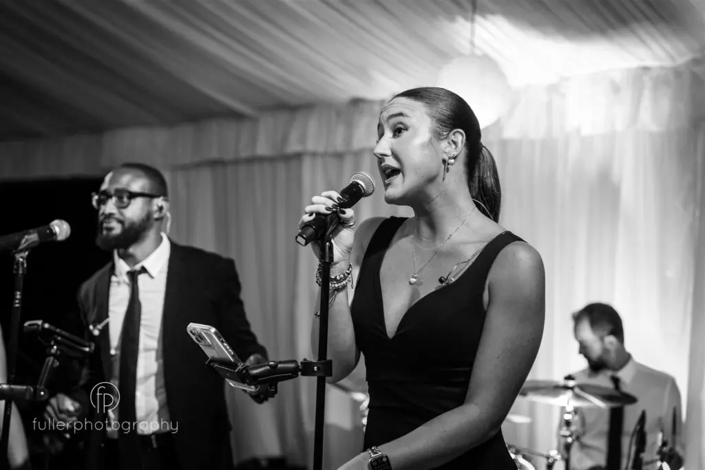 Mae, lead singer of Back2Life band, performing a ballad