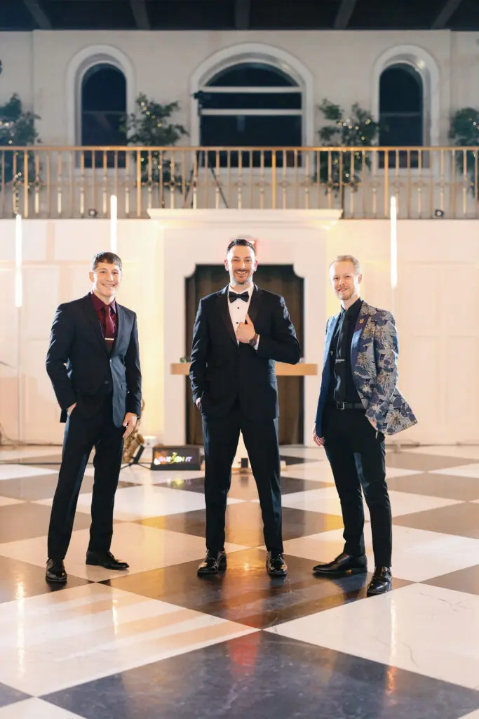 DJ Pat setting up with On It Productions staff for wedding by Jessica Lynn Photography