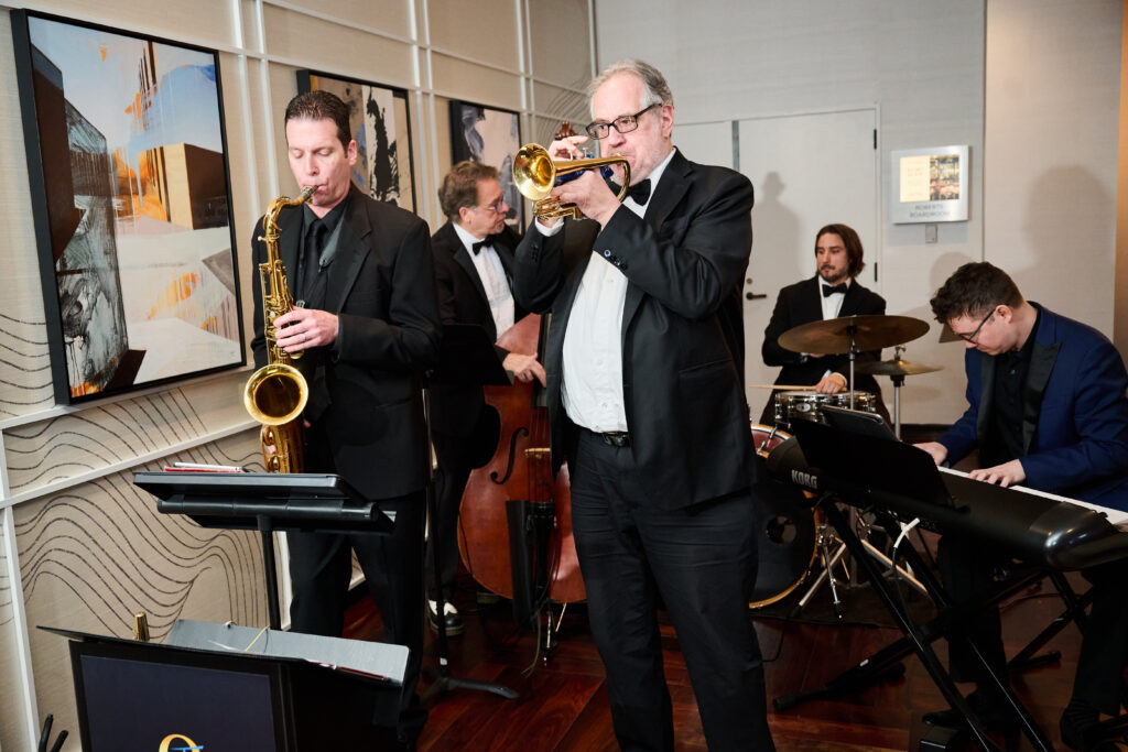 5 piece swing band performing at Loews Hotel