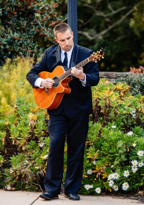 Andrew Behringer playing the acoustic guitar at Philly wedding