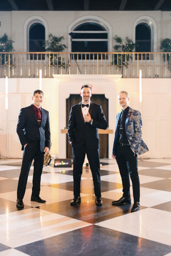 DJ Pat setting up with On It Productions staff for wedding by Jessica Lynn Photography