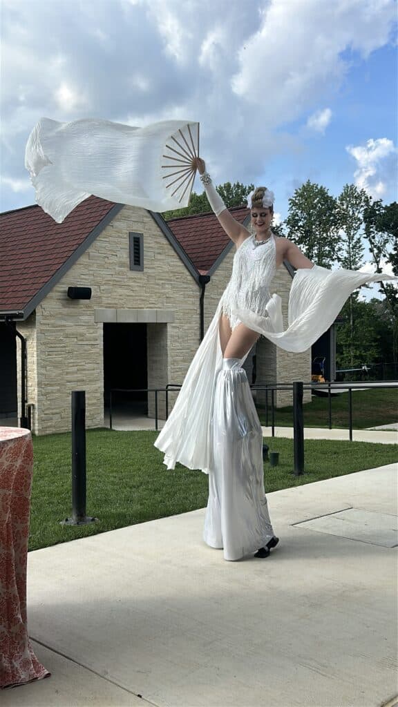 Stilt Walker Performer in White