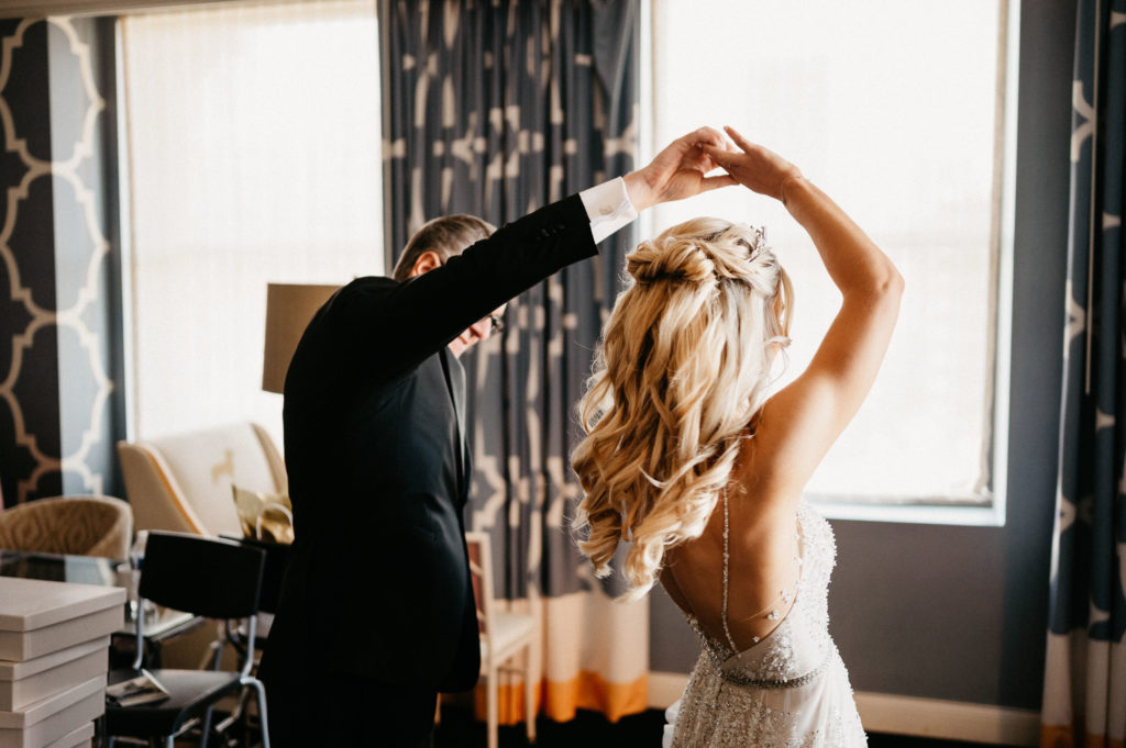 bride twirling on wedding day