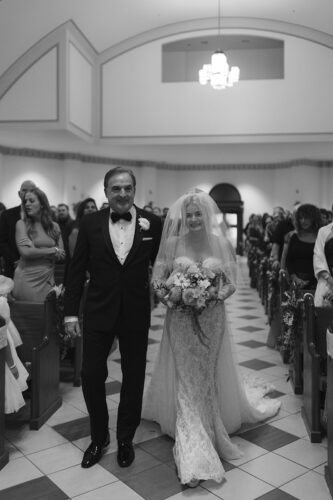 Father walking bride down the aisle
