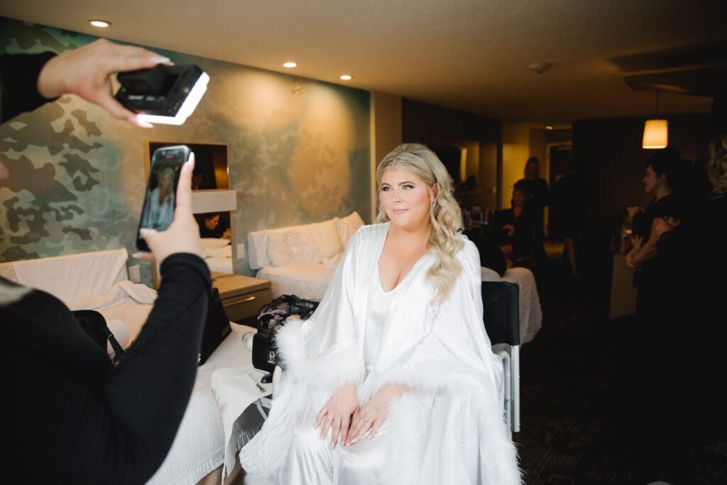 Bride after getting her wedding hair done Photo by Asya Photography