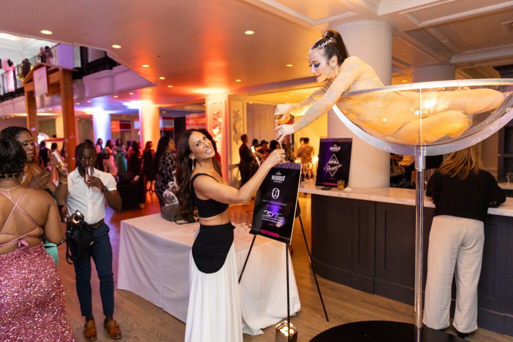 MArtini Pourer pouring champagne at Philly Social Awards